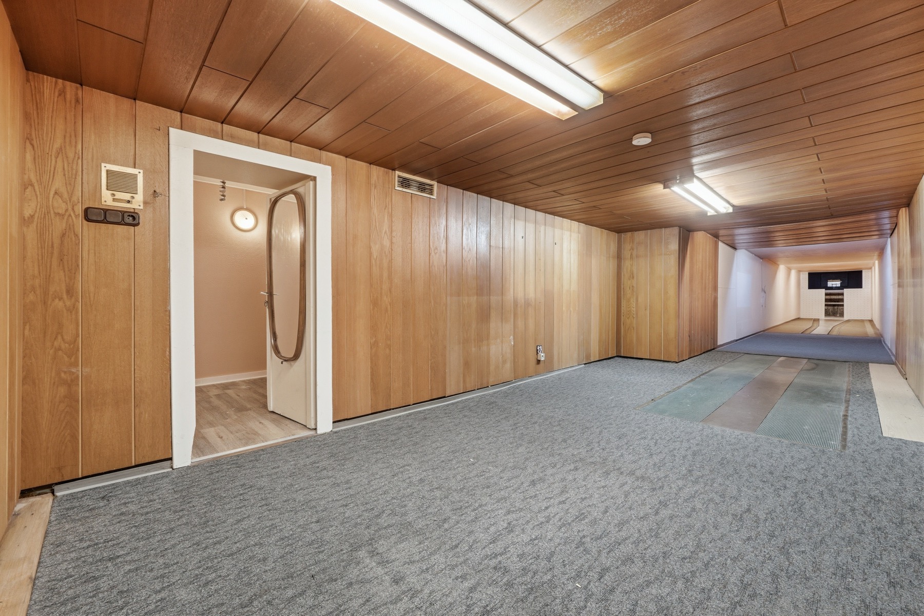 Lounge area beside the bowling lane